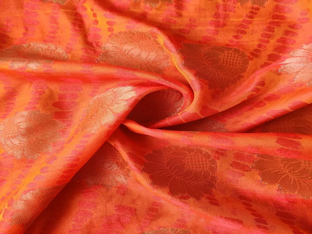 Orange Dual Shade Self Floral Banarasi Silk Fabric
